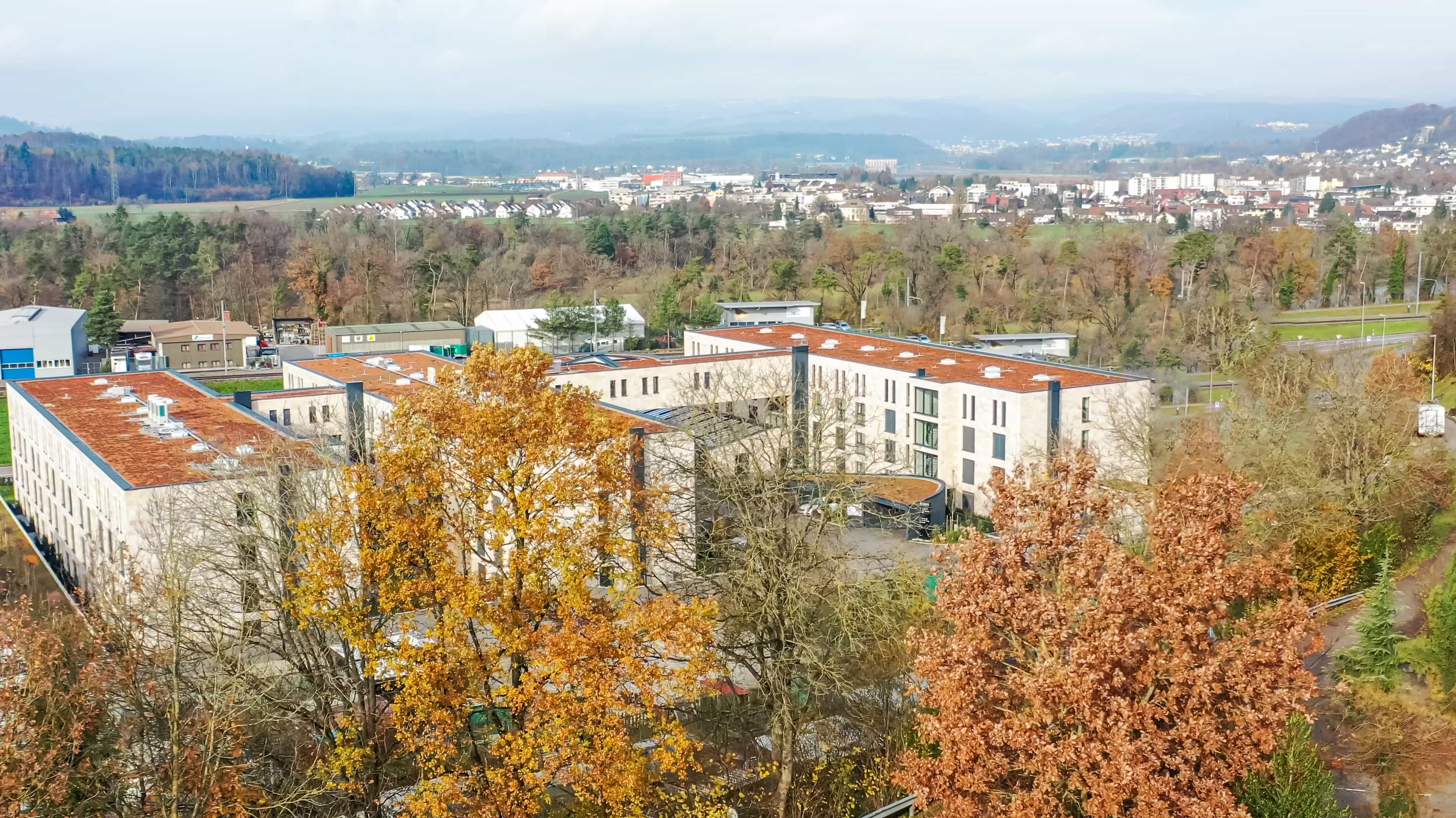 La Maison Suisse Döttingen with the surrounding landscape in the background